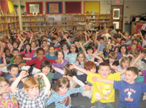 Students in library w big arms